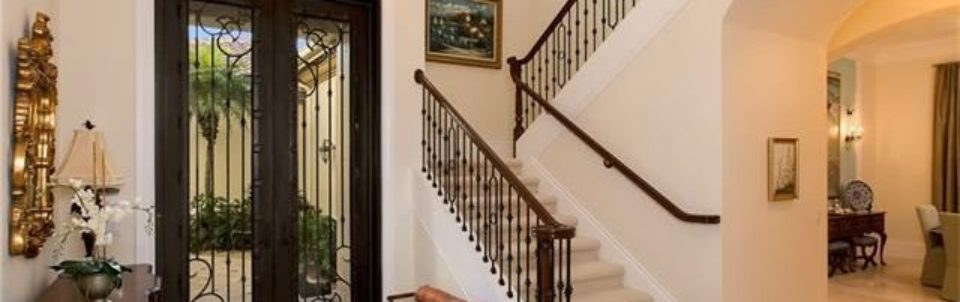 This Switchback staircase has an oak bullnose starting step with matching Old World Millwork oak newel and handrail.